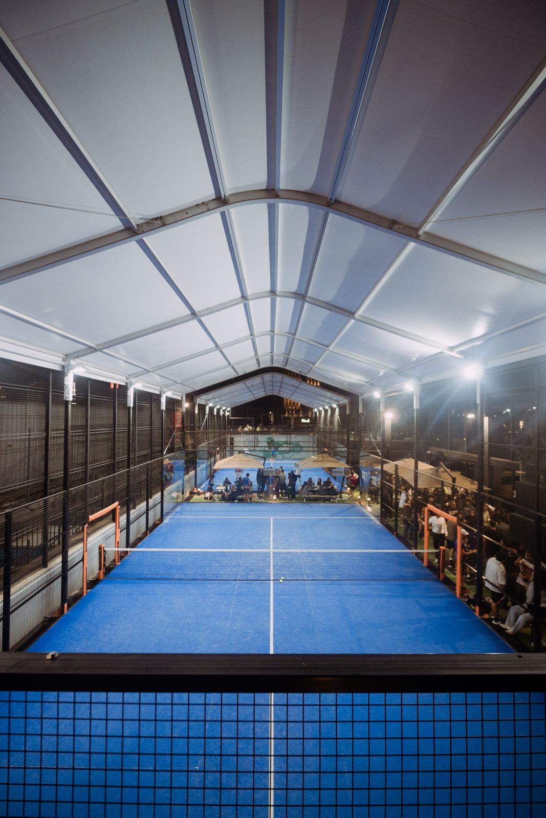 Padel court view with players